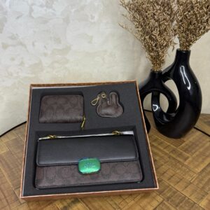 Sac coach  avec porte monnaire